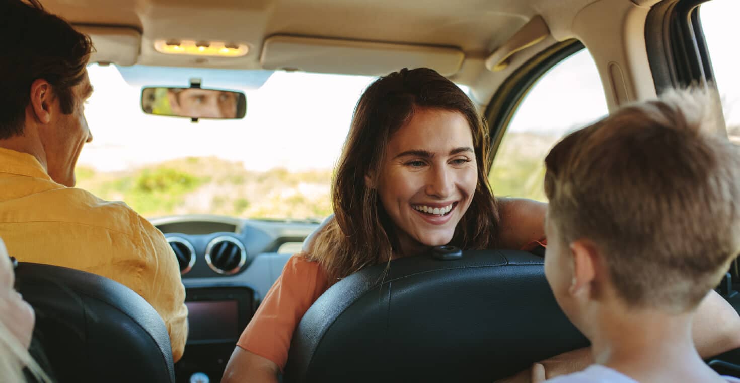 family in car